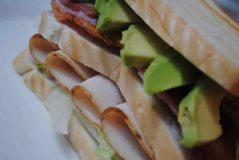 Turkey, bacon and avocado club sandwich