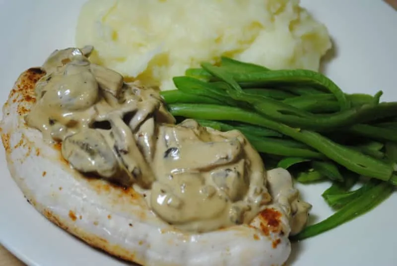Creamy mushroom chicken with mash and green beans